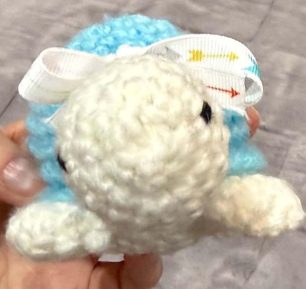 Handmade Crochet Sea Turtle Plushie with Blue Shell and Arrow Bow